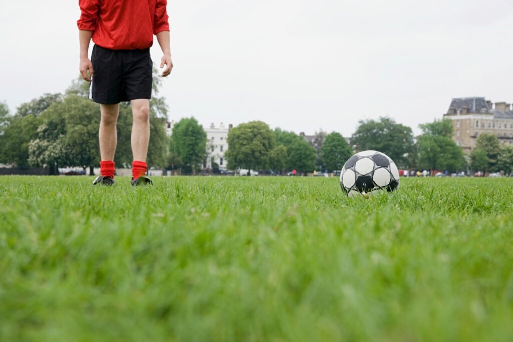 Footballer and football